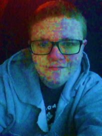 A person wearing glasses and a blue hoodie

AI-generated content may be incorrect.
