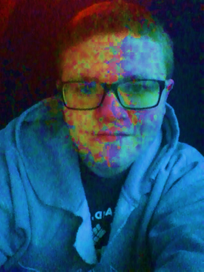 A person wearing glasses and a blue hoodie

AI-generated content may be incorrect.