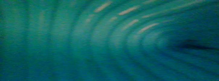 A blue tunnel with a hole in it

AI-generated content may be incorrect.