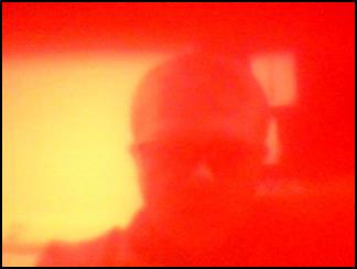 A blurry image of a person wearing a helmet and sunglasses

AI-generated content may be incorrect.